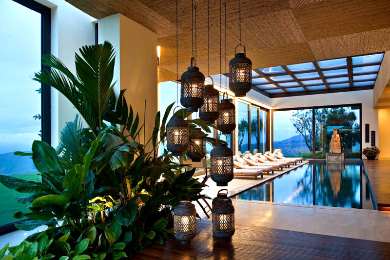 indoor-pool-with-lanterns-and-greenery